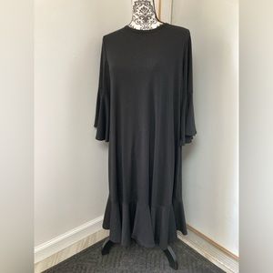 LulaRoe Maurine, Size L, 96% polyester, 4% spandex.  Solid black.  Not slinky.